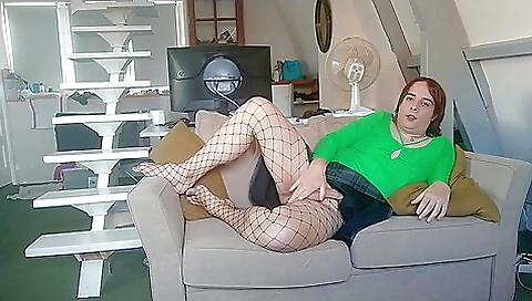 French amateur blonde girl in a black top and a black skirt