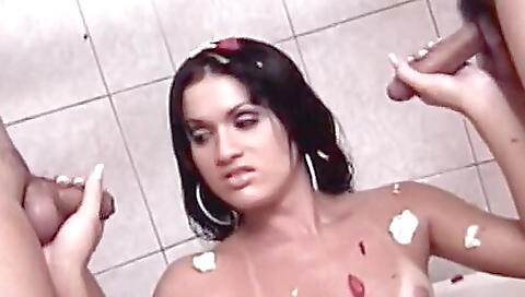 Slutty shemale gets fucked by two men at the same time