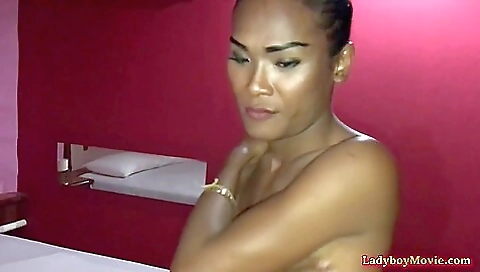 Asian 18+ chick fucks on her own cock in her mouth and in ass